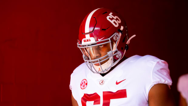 Alabama Crimson Tide defensive lineman JC Latham (65) against the Florida Gators at Ben Hill Griffin Stadium.